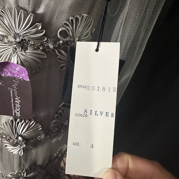 Terani Couture Silver Sequin Wedding Gown with Halter Neckline - Picture 4 of 11